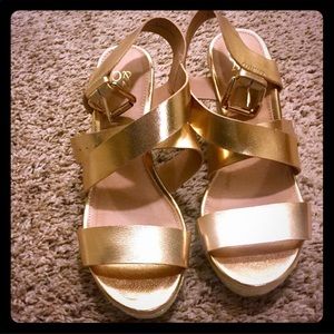 Slightly worn N&Y company golden sandals.